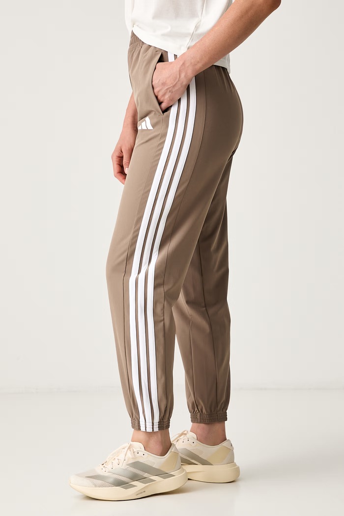 adidas Performance spodnie treningowe damskie Essentials beżowy KT3790