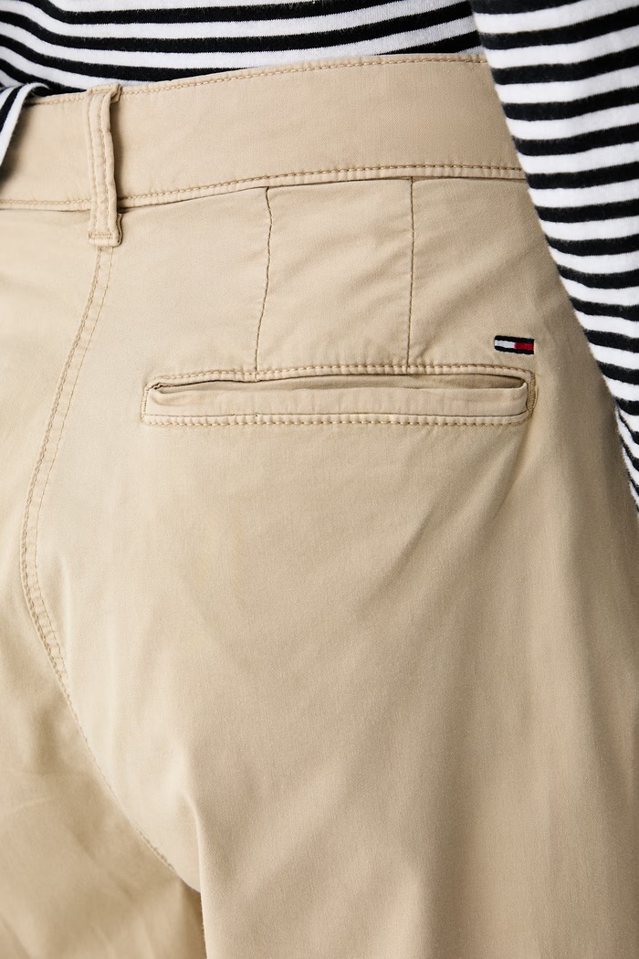 Tommy Jeans hlače s širokimi hlačnicami ženske z bombažem bež DW0DW21698