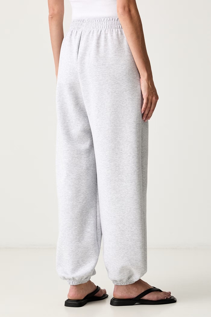 Oblečenie adidas teplákové nohavice dámske Soft Lux KS7876 sivá