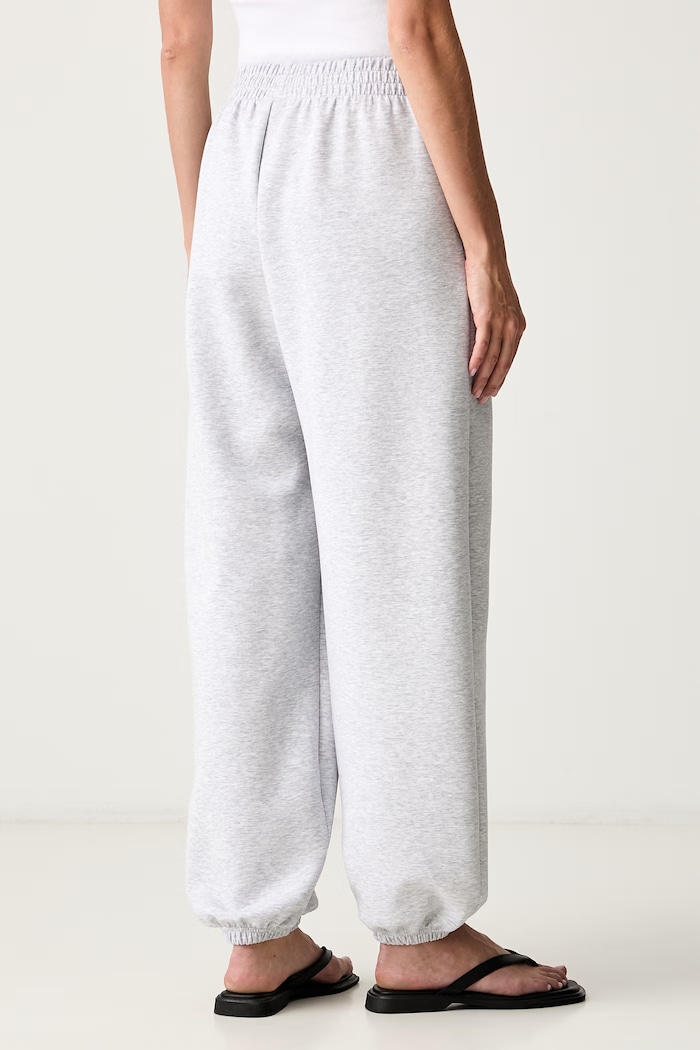 Oblečenie adidas teplákové nohavice dámske Soft Lux KS7876 sivá