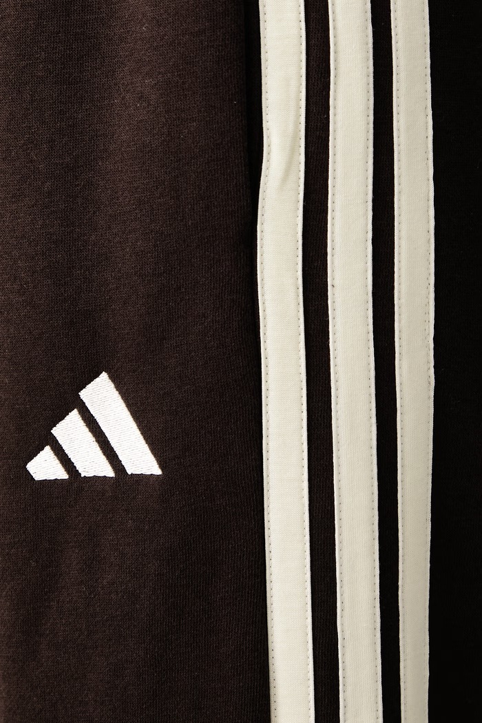 Spodnie dresowe damskie z bawełną Essentials adidas brązowy KX0790