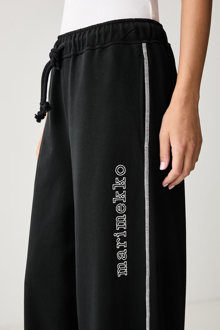 Teplákové nohavice detské bavlnené Marimekko 096223 čierna