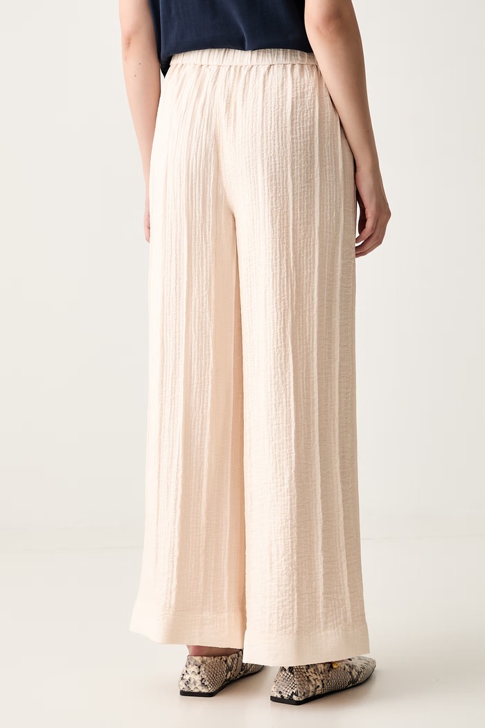Oblečenie Calvin Klein nohavice dámske s viskózou LV044G643G béžová