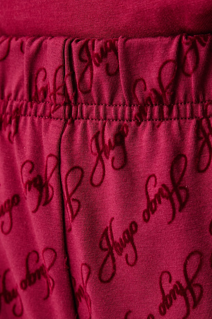 Spodnie lounge damskie z bawełną FLOKKY_PANT HUGO 50566682 czerwony