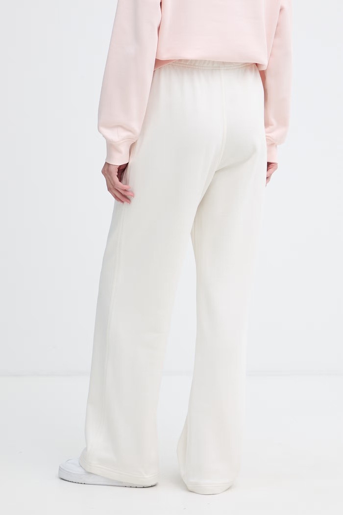 Odzież Calvin Klein Jeans spodnie dresowe damskie bawełniane LV047G822G beżowy