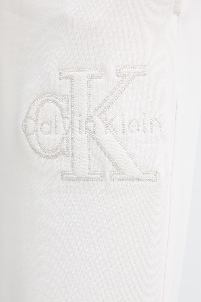 Calvin Klein Jeans spodnie dresowe damskie bawełniane beżowy LV047G822G