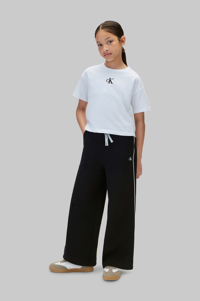 Dziewczynka Calvin Klein Jeans Spodnie dresowe dziecięce z bawełną LVCKFJC18G.9BY2 czarny