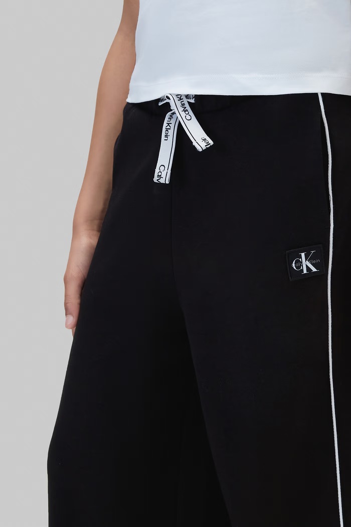 Calvin Klein Jeans Spodnie dresowe dziecięce z bawełną LVCKFJC18G.9BY2