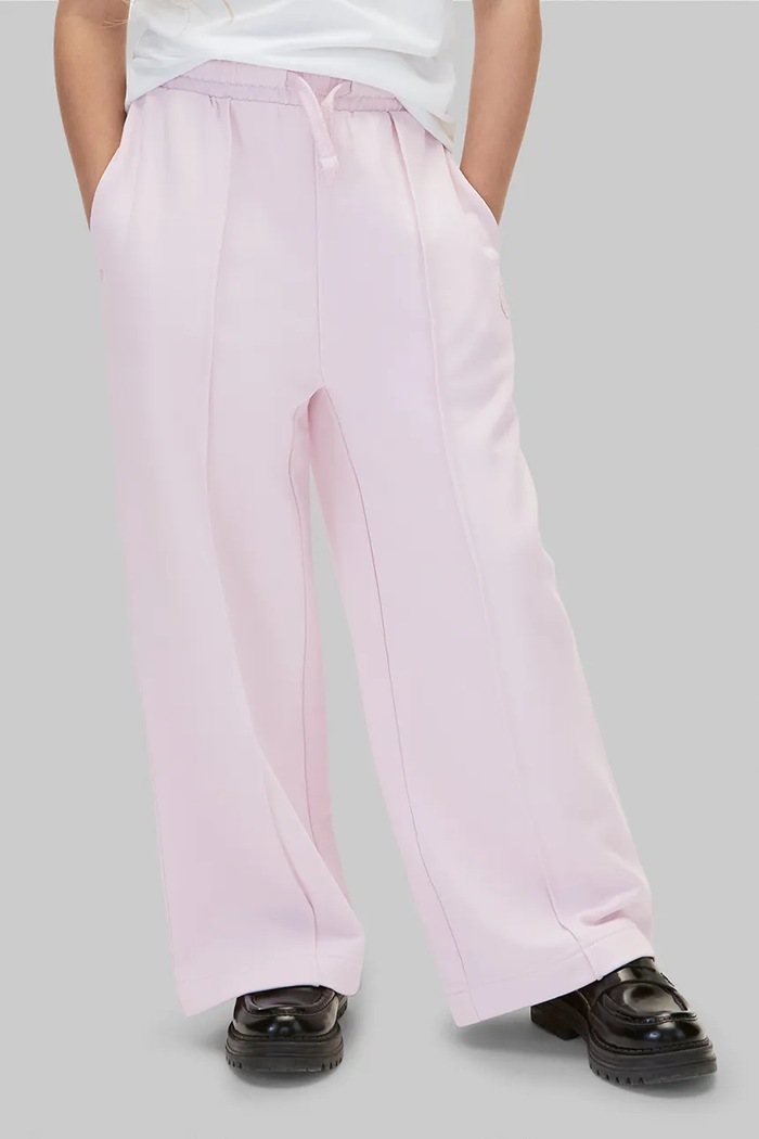 Calvin Klein Jeans spodnie dresowe dziecięce bawełniane fioletowy LVCKFJC19G.104.116.9BY2