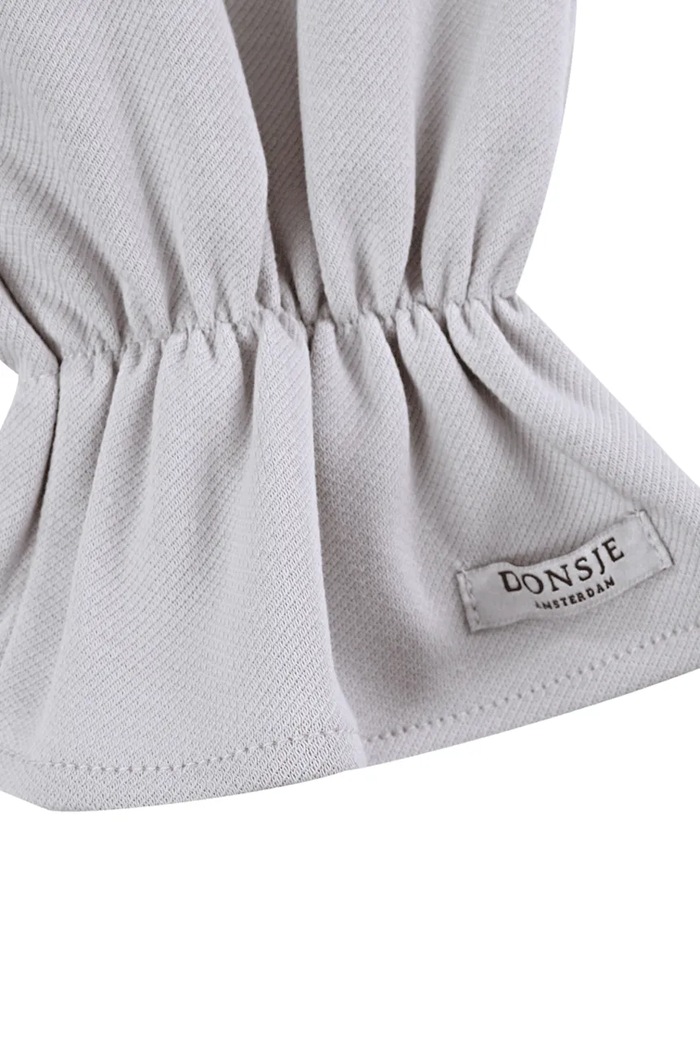 Donsje spodnie dresowe dziecięce bawełniane Lindelwa Trousers 3053200 beżowy
