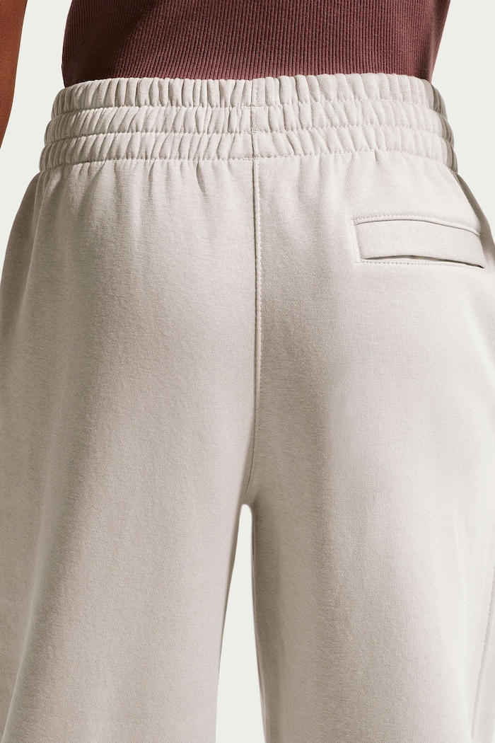 Chłopiec Nike Spodnie dresowe dziecięce z bawełną Nike Sportswear Club IO1694 beżowy