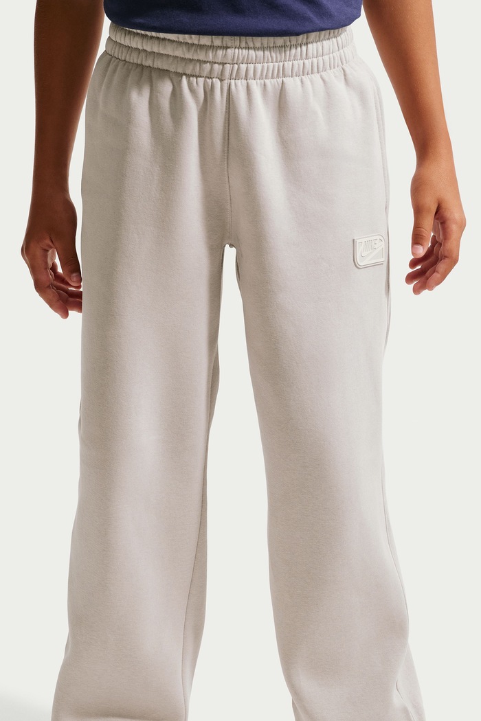 Spodnie dresowe dziecięce z bawełną Nike Sportswear Club Nike IO1694 beżowy
