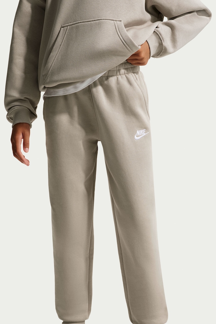 Spodnie dresowe dziecięce z bawełną Nike Sportswear Club Fleece Nike beżowy FD3008