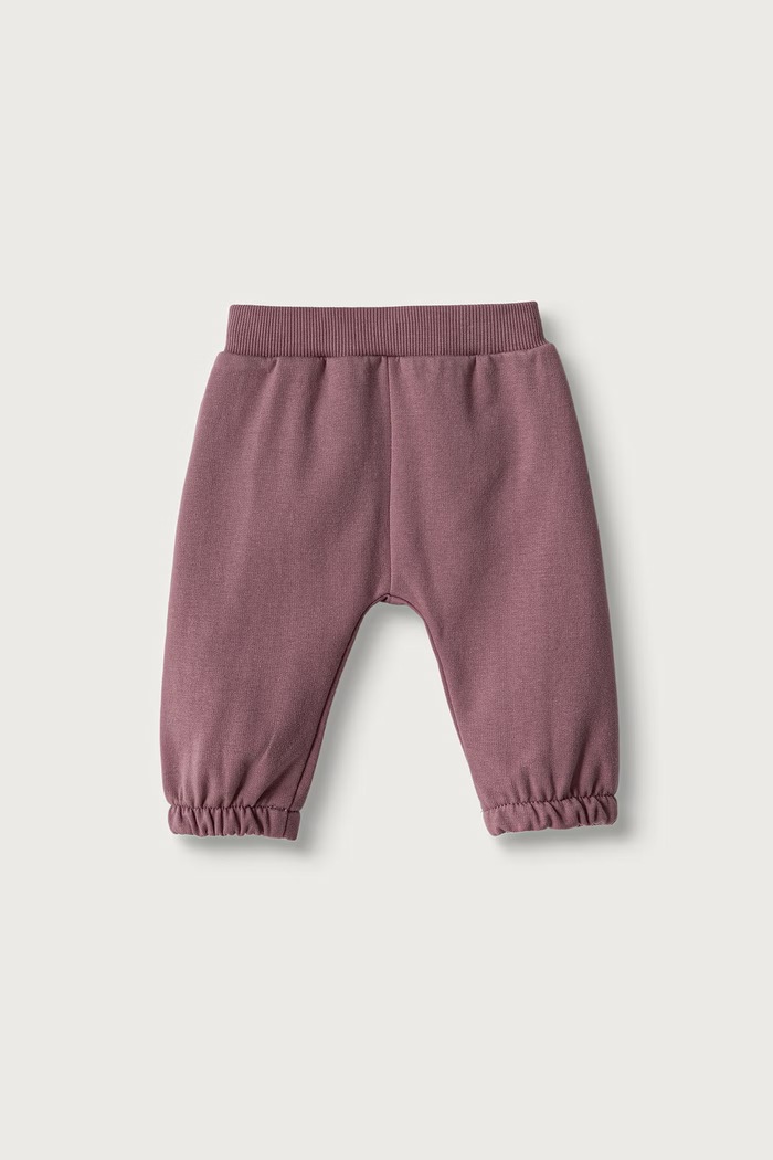 United Colors of Benetton Spodnie dresowe niemowlęce z bawełną 3YWVAF02P.W.Seasonal fioletowy AW26