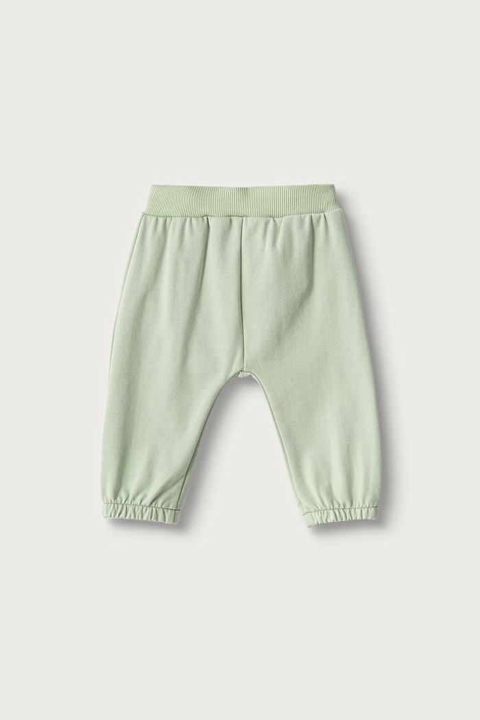 United Colors of Benetton Spodnie dresowe niemowlęce z bawełną 3YWVAF02P.W.Seasonal zielony AW26