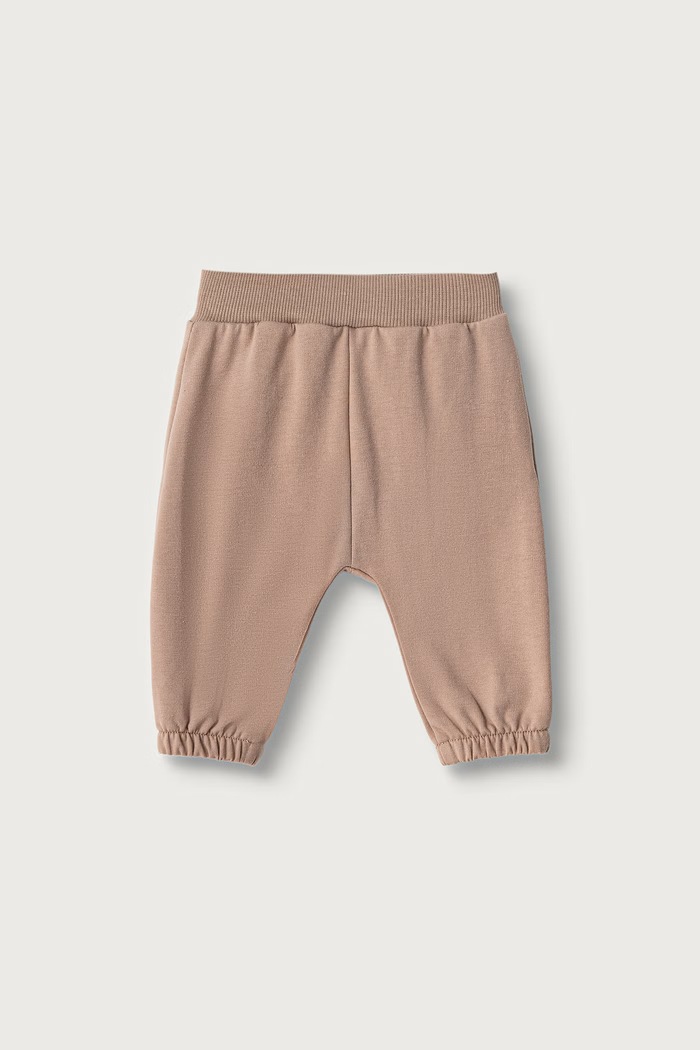 United Colors of Benetton Spodnie dresowe niemowlęce z bawełną 3YWVAF02P.W.Seasonal brązowy AW26