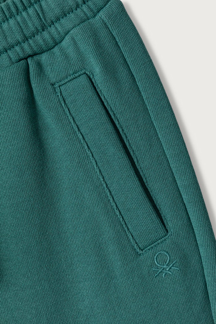 Chłopiec United Colors of Benetton Spodnie dresowe dziecięce bawełniane 3J70GF05J.P.Seasonal turkusowy