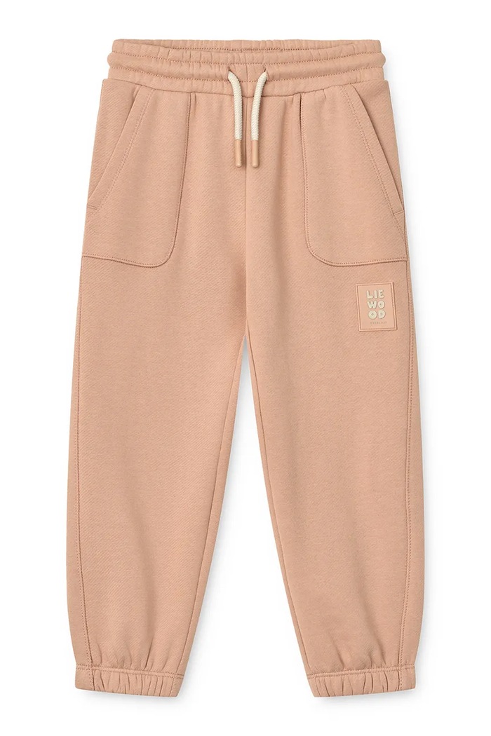 Liewood Spodnie dresowe dziecięce bawełniane Carey Sweatpants różowy LW20779.9BY2