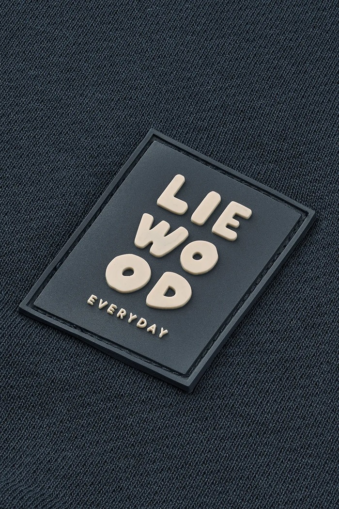 Spodnie dresowe dziecięce bawełniane Carey Sweatpants Liewood LW20779.9BY2 granatowy