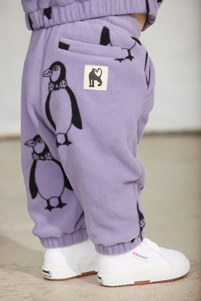 Mini Rodini spodnie joggery dziecięce polarowe Penguin fioletowy 11000365