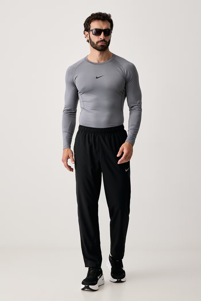 Nike Spodnie treningowe męskie Form Dri-FIT FB7490.010 czarny AW26