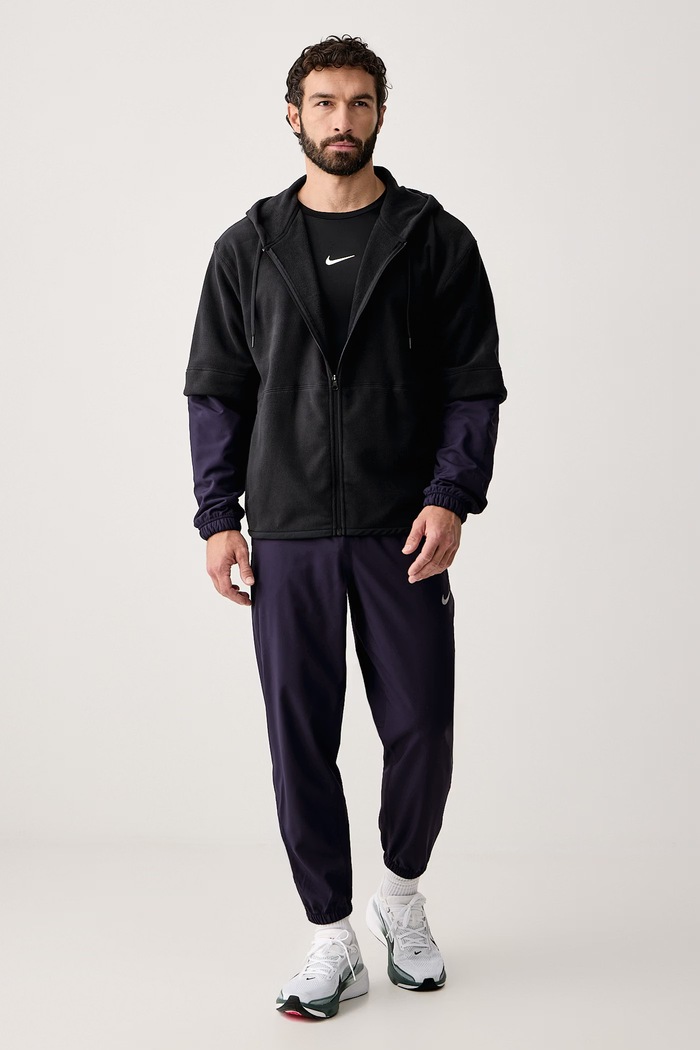 Nike Spodnie treningowe męskie Form Dri-FIT FB7497.525 fioletowy AW26
