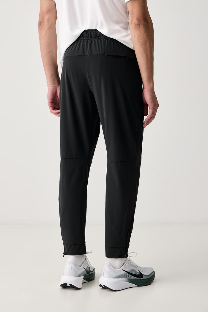 Odzież Nike Spodnie treningowe męskie Unlimited Dri-FIT FB7548.010 czarny