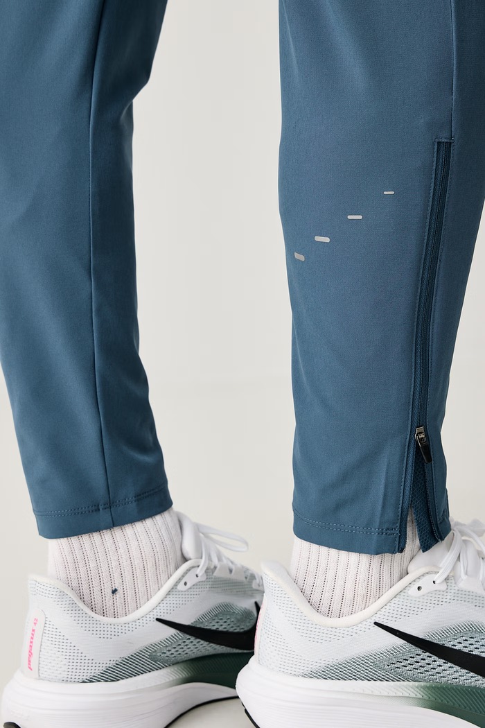 Spodnie dresowe męskie Stride Dri-FIT Nike HV4544.438 niebieski