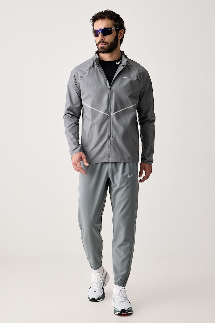 Nike Spodnie do biegania męskie Miler Dri-FIT IF2062.084 szary AW26