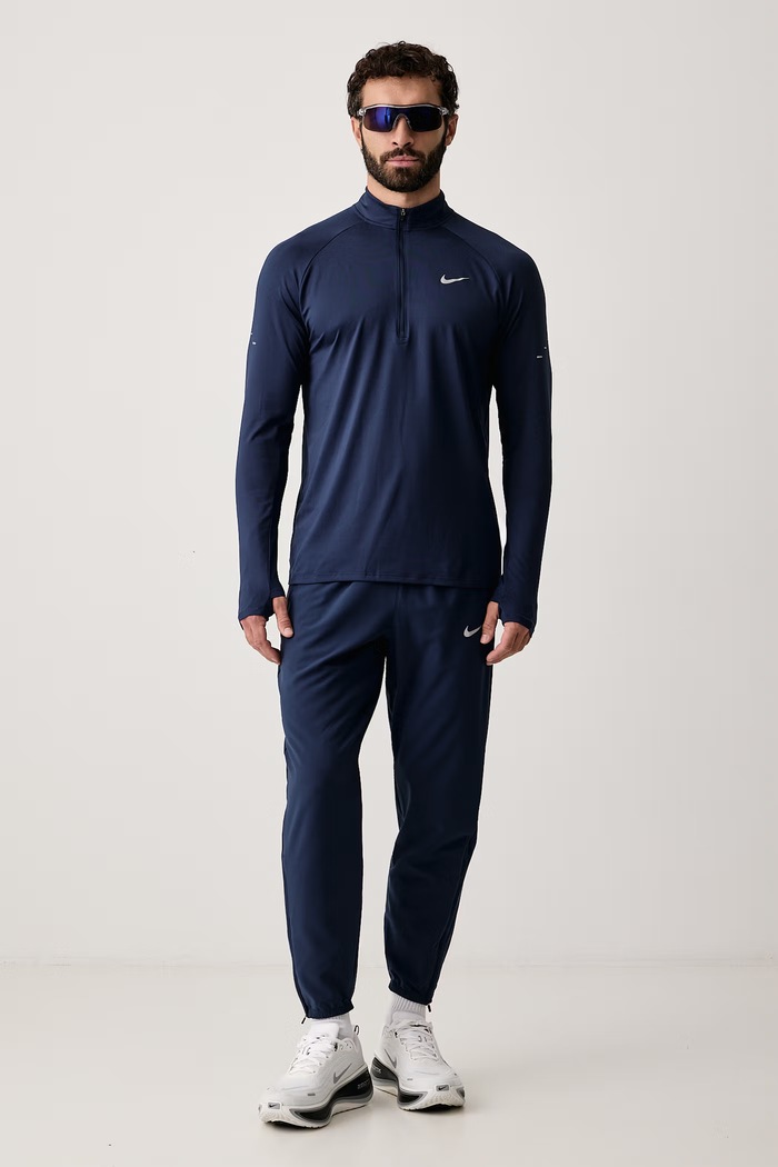 Nike Spodnie do biegania męskie Miler Dri-FIT IF2062.410 granatowy AW26