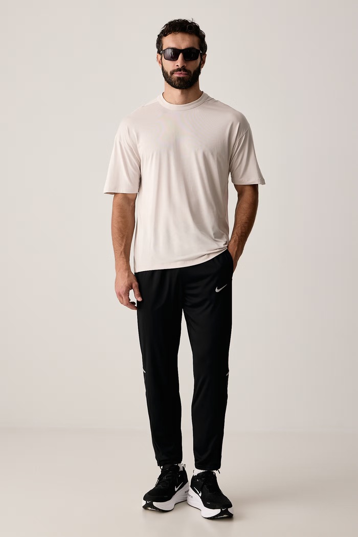 Nike Spodnie do biegania męskie Miler Dri-FIT IF2064.010 czarny AW26