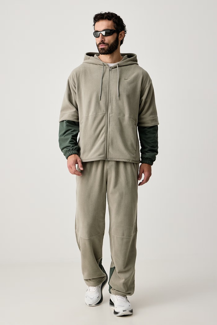 Nike Spodnie treningowe męskie polarowe Therma-FIT IX7293.320 zielony AW26