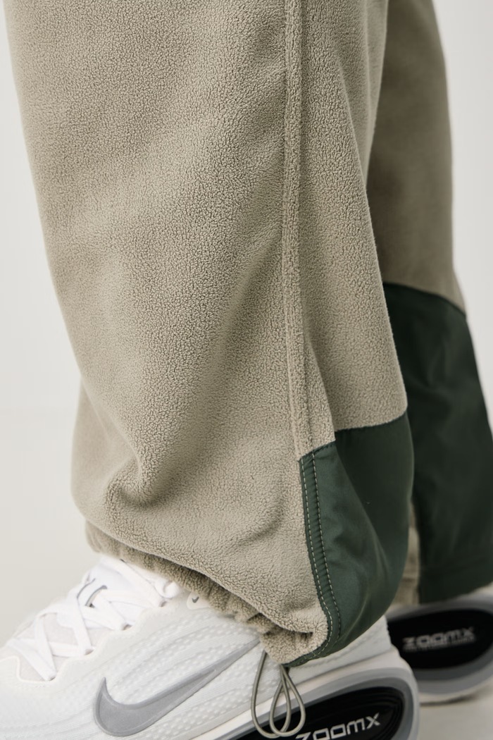 Nike Spodnie treningowe męskie polarowe Therma-FIT IX7293.320