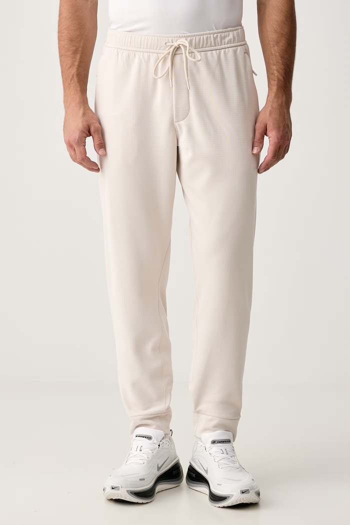 Nike Spodnie treningowe męskie Primary NanoKnit Therma-FIT beżowy IM7219.104