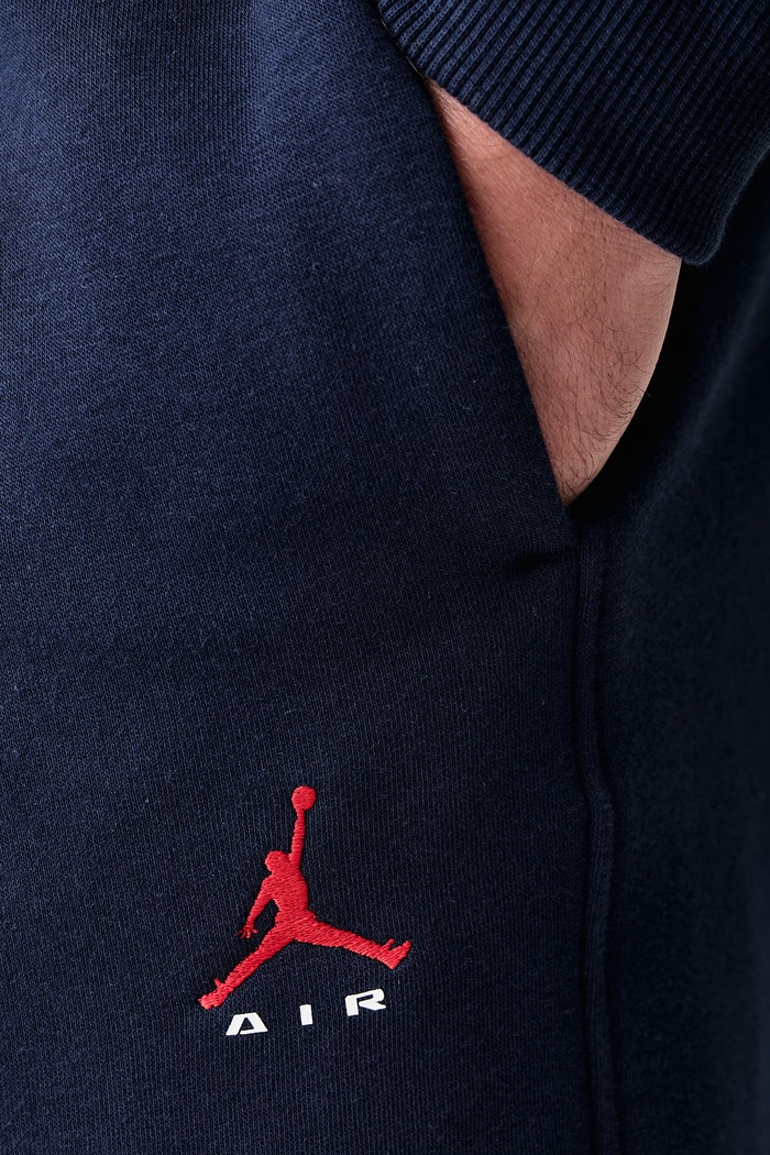 Spodnie dresowe męskie z bawełną Brooklyn Fleece Jordan IM8906.419 granatowy
