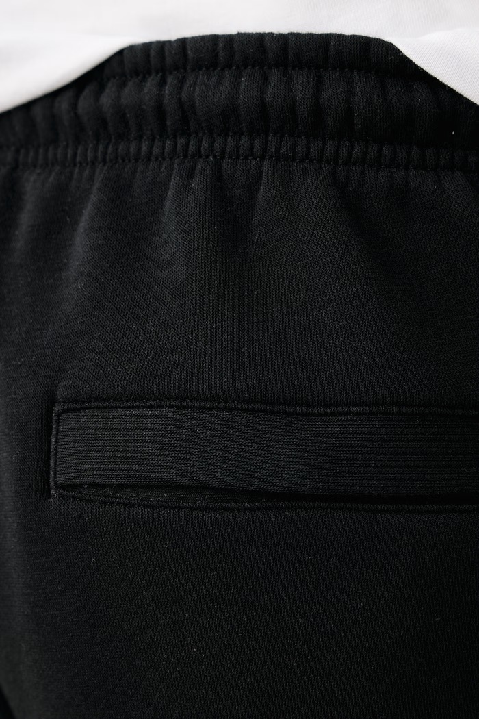 Spodnie joggery męskie z bawełną Club Nike Sportswear FN3787.010 czarny