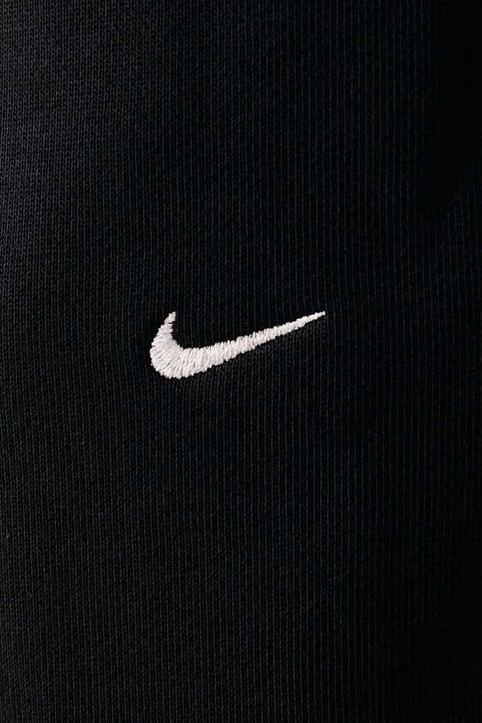 Spodnie dresowe męskie z bawełną Solo Swoosh Nike Sportswear HV1090.010 czarny