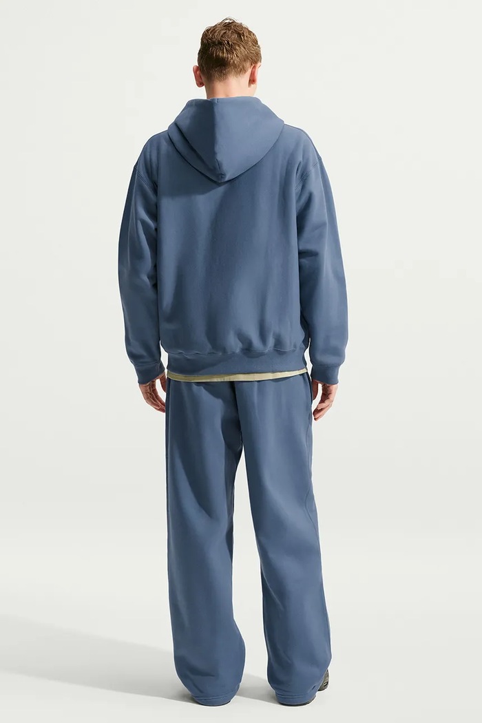 Nike Sportswear Spodnie dresowe męskie z bawełną Solo Swoosh HV1090.491 niebieski AW26