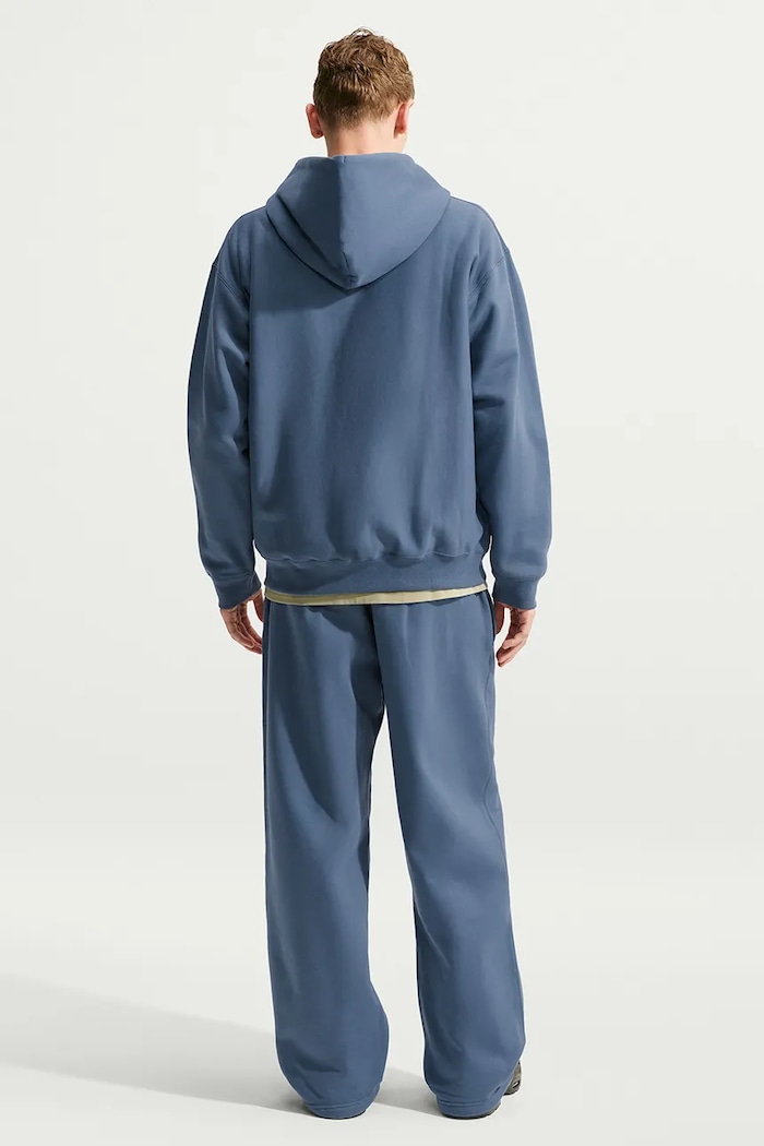 Nike Sportswear Spodnie dresowe męskie z bawełną Solo Swoosh HV1090.491 niebieski AW26