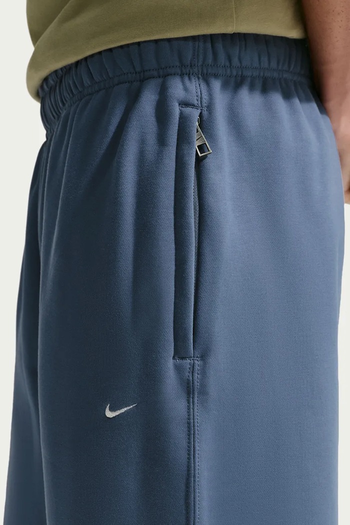 Spodnie dresowe męskie z bawełną Solo Swoosh Nike Sportswear HV1090.491 niebieski
