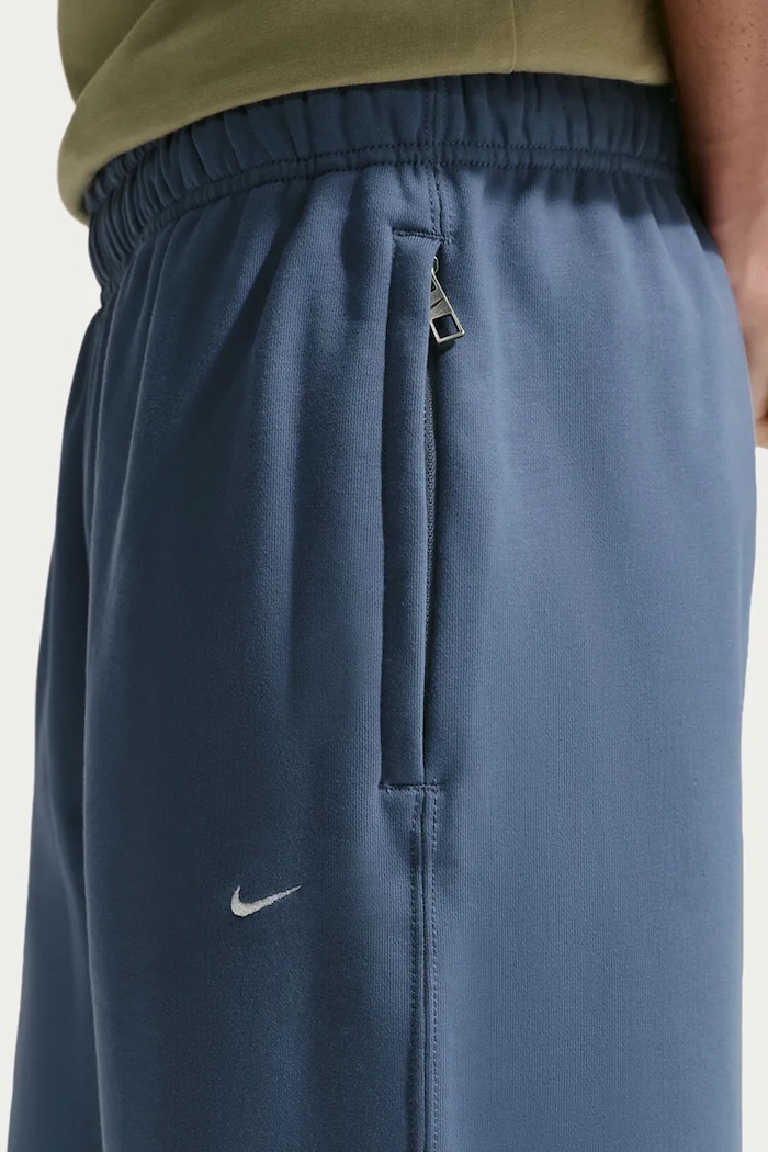 Spodnie dresowe męskie z bawełną Solo Swoosh Nike Sportswear HV1090.491 niebieski