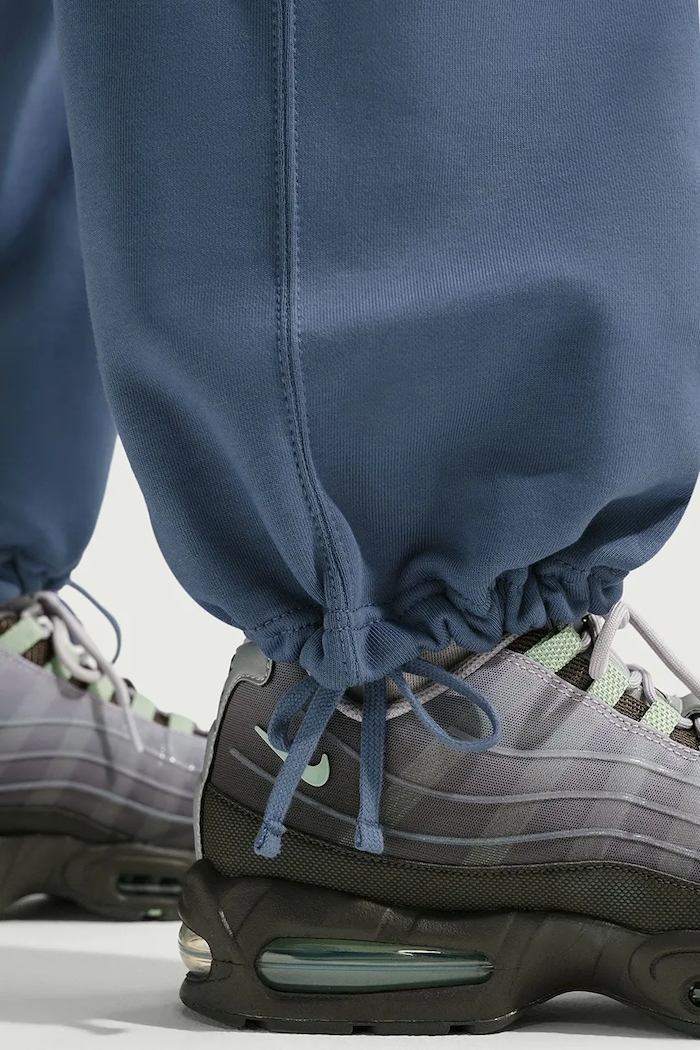Spodnie dresowe męskie z bawełną Solo Swoosh Nike Sportswear niebieski HV1090.491