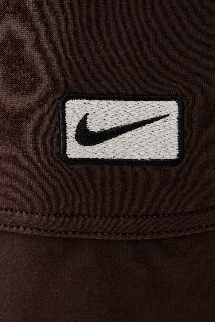 Spodnie dresowe męskie z bawełną Nike Sportswear IV5627.237 brązowy