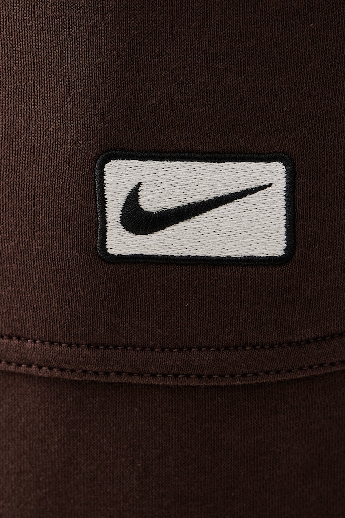Spodnie dresowe męskie z bawełną Nike Sportswear IV5627.237 brązowy