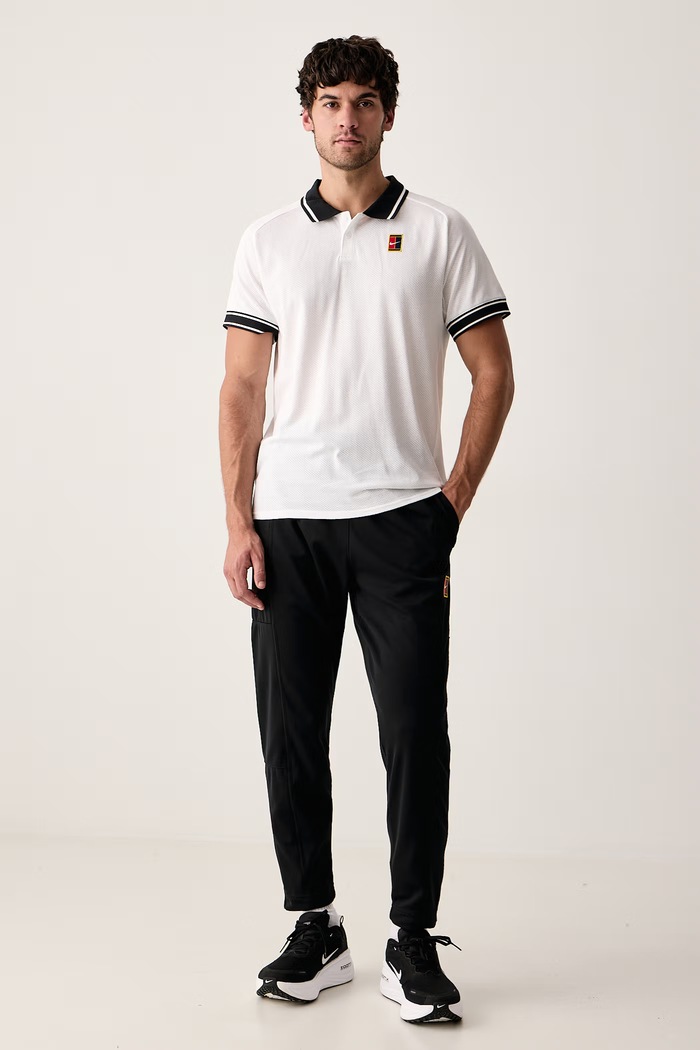Nike Sportswear Spodnie treningowe damskie NikeCourt Heritage FZ6928.010 czarny AW26