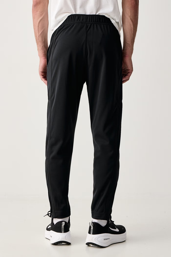 Odzież Nike Sportswear Spodnie treningowe damskie NikeCourt Heritage FZ6928.010 czarny