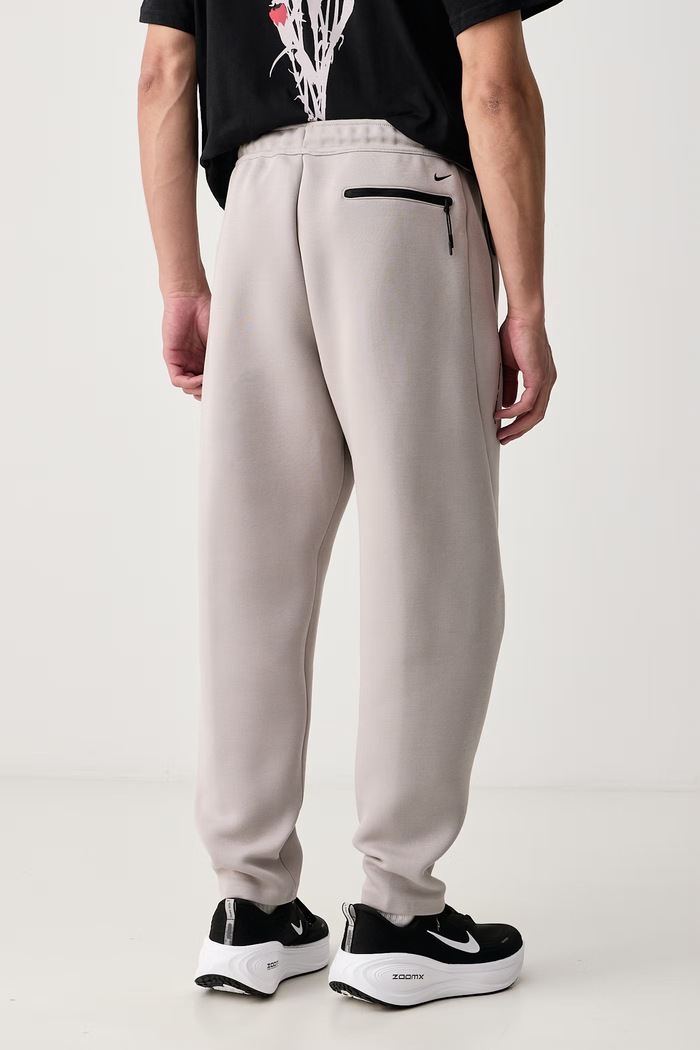 Odzież Nike Sportswear Spodnie dresowe męskie Tech IM6219.009 beżowy