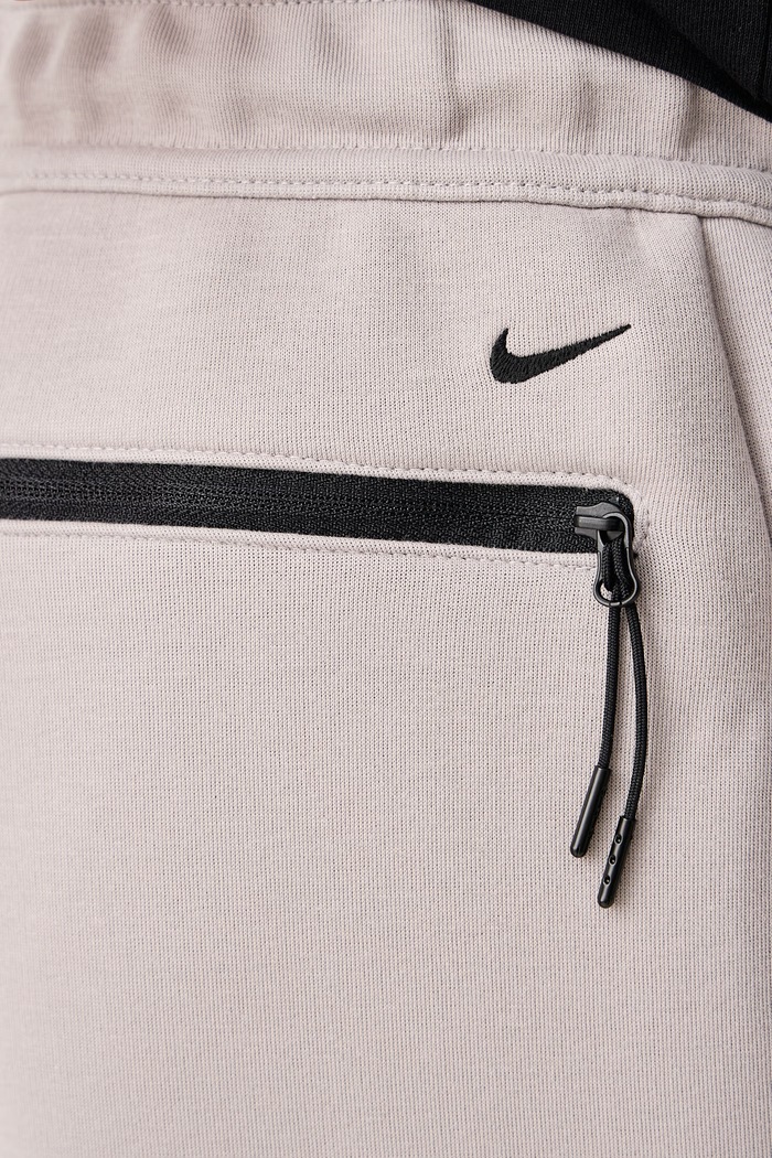 Spodnie dresowe męskie Tech Nike Sportswear IM6219.009 beżowy