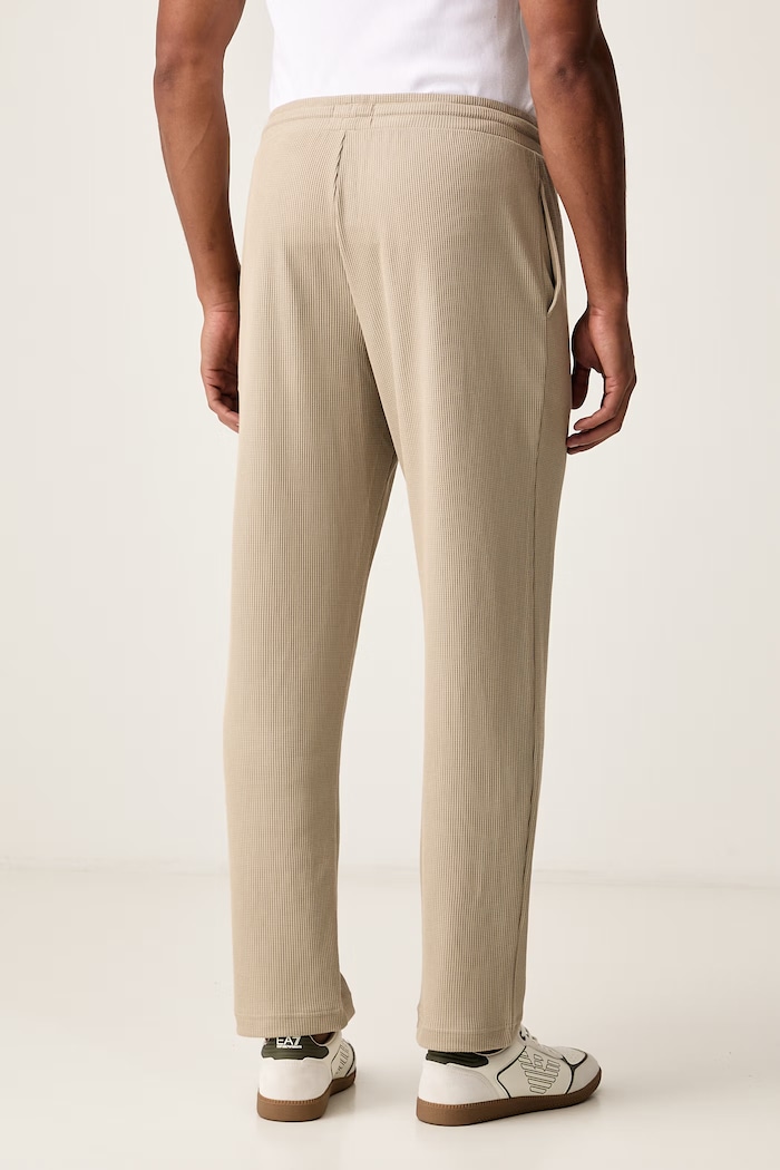 Odzież Emporio Armani Underwear Spodnie lounge męskie z bawełną EM001870.AF25051 beżowy