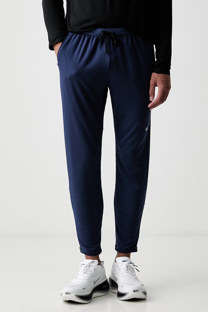 Nike spodnie treningowe męskie Stride granatowy HV4546.410
